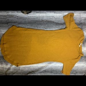 Mustard colored dress.